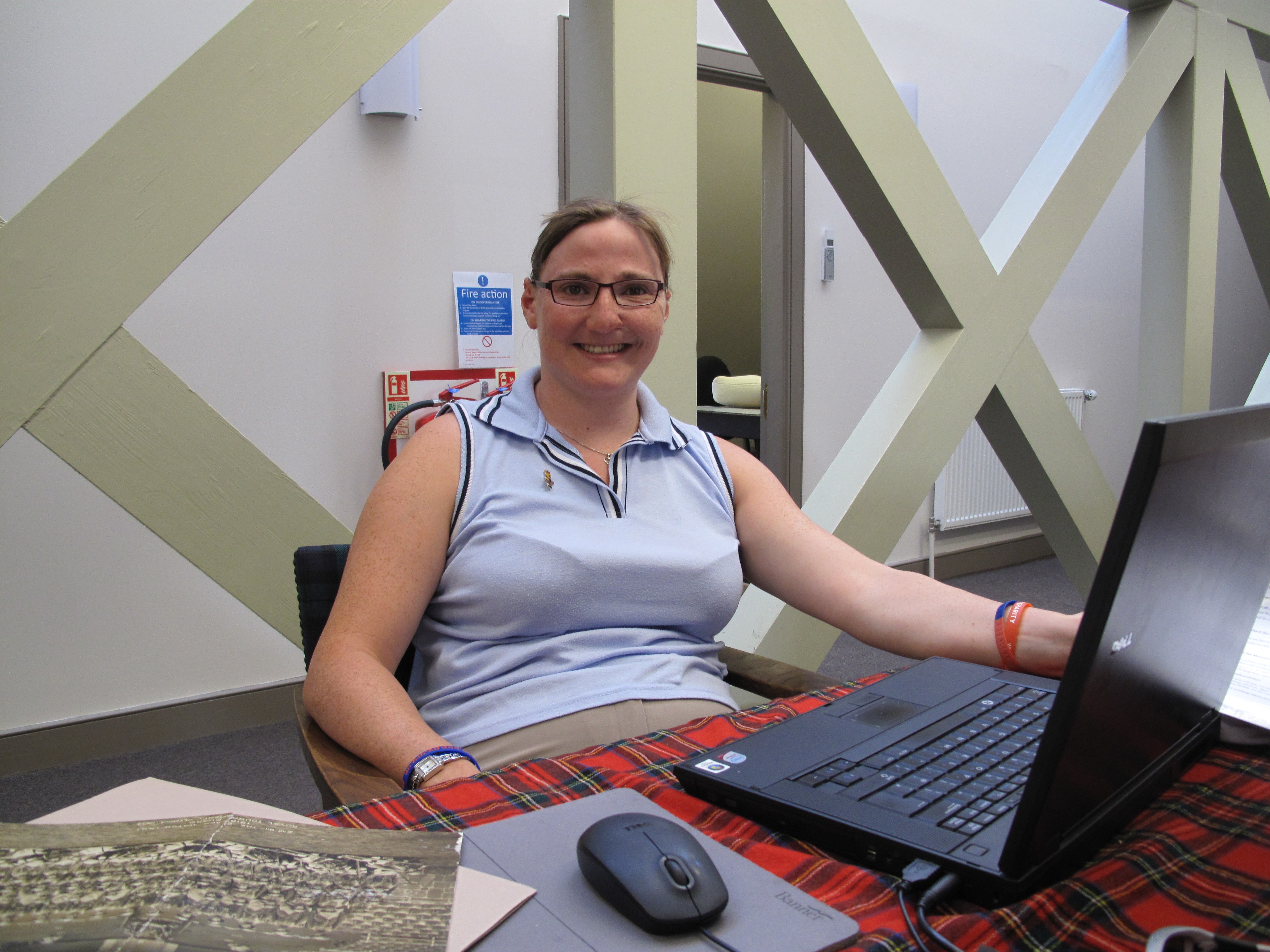 Laura works with a team of volunteers to help inventory artefacts and update our collections management system.