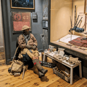 Children trying on Black Watch uniforms