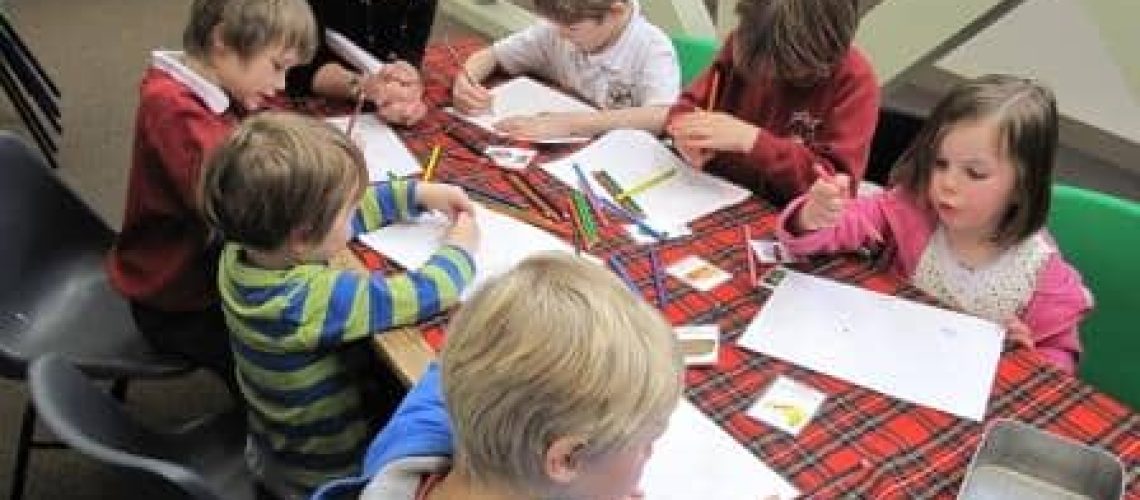 Emily helps a class of nursery children from Murthly Primary School design their own rations for a First World War soldier.